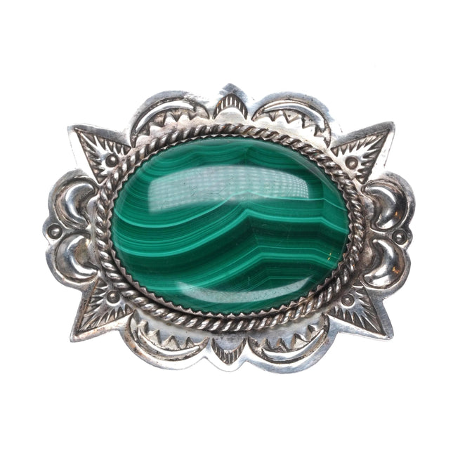 A Secatero Navajo sterling silver malachite hand stamped pendant/pin