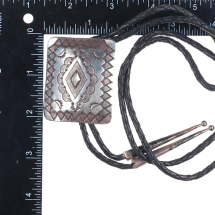 Vintage Herman Smith Navajo rug pattern sterling silver heavily stamped bolo tie