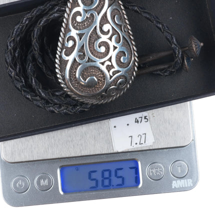 1991 Chambers Sterling Silver southwestern scrollwork bolo tie