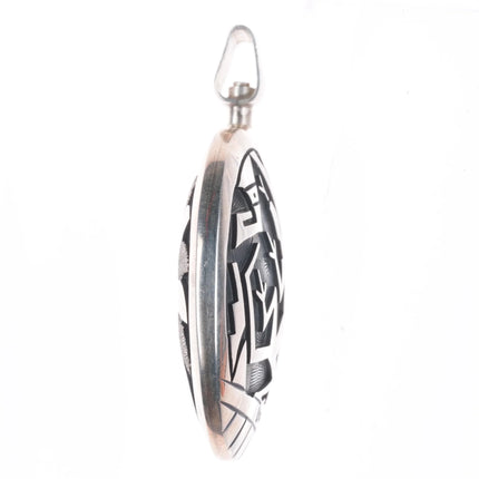 Cheryl Wadsworth Hopi overlay spinner gecko/sunface pendant sterling silver