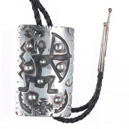Large Vintage G Holiday Navajo sterling silver Mimbres hunter overlay bolo tie