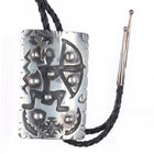 Large Vintage G Holiday Navajo sterling silver Mimbres hunter overlay bolo tie