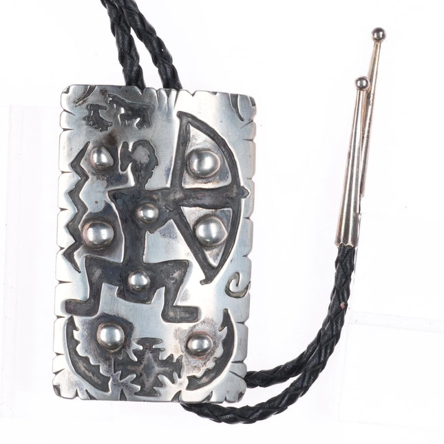 Large Vintage G Holiday Navajo sterling silver Mimbres hunter overlay bolo tie