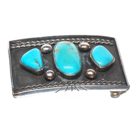 Vintage Navajo sterling silver belt buckle with three turquoise
