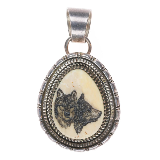 Artie Yellowhorse Navajo sterling silver hand carved wolves pendant/pin