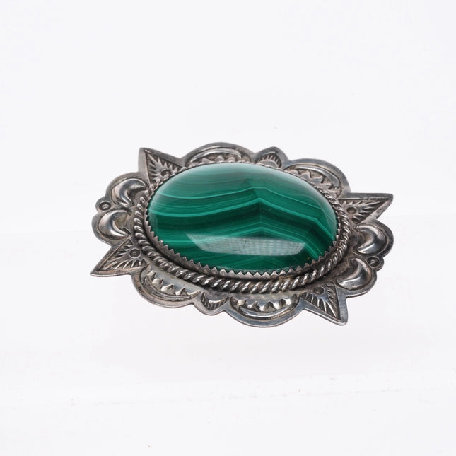 A Secatero Navajo sterling silver malachite hand stamped pendant/pin