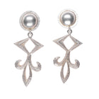 Vintage Navajo Tufa cast sterling silver long dangle earrings