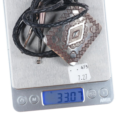 Vintage Herman Smith Navajo rug pattern sterling silver heavily stamped bolo tie