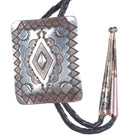 Vintage Herman Smith Navajo rug pattern sterling silver heavily stamped bolo tie