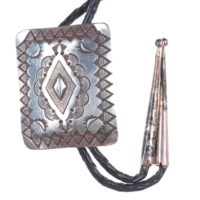 Vintage Herman Smith Navajo rug pattern sterling silver heavily stamped bolo tie