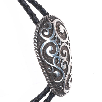 1991 Chambers Sterling Silver southwestern scrollwork bolo tie