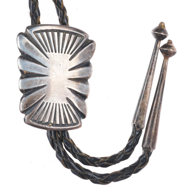 c1960 c-31 Navajo sterling silver plain silver  rayed design bolo tie