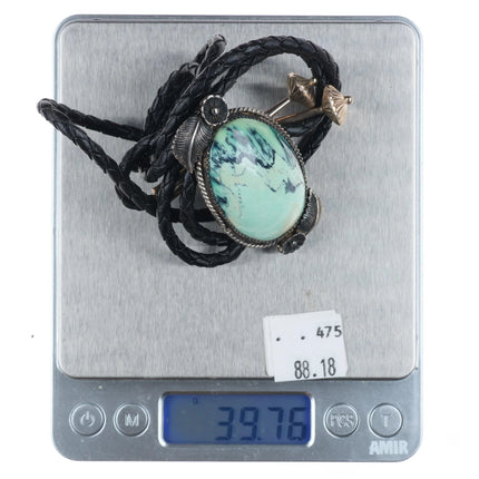 Vintage Southwestern sterling silver variscite bolo tie with feather designs