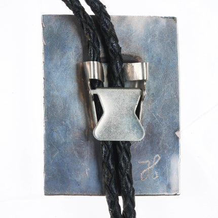 Vintage southwestern sterling silver bear bolo tie with turquoise