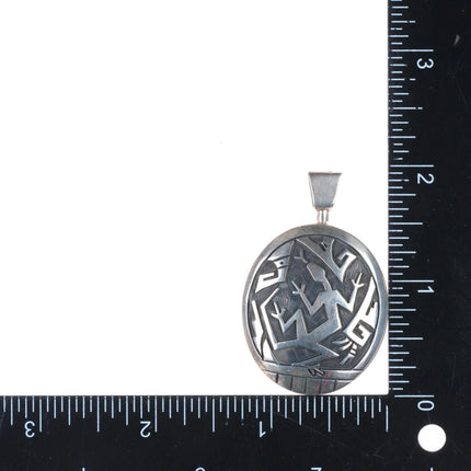 Cheryl Wadsworth Hopi overlay spinner gecko/sunface pendant sterling silver