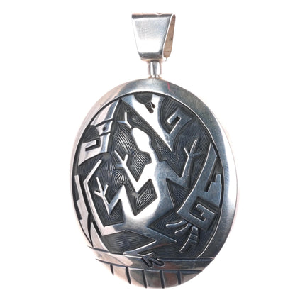 Cheryl Wadsworth Hopi overlay spinner gecko/sunface pendant sterling silver