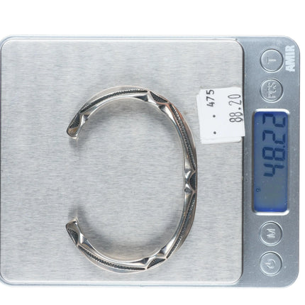 7" Harry H Begay Navajo carinated heavily stamped sterling silver cuff bracelet