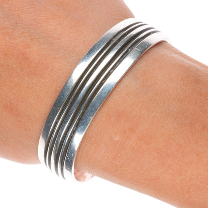 6.25" Vintage Navajo sterling silver banded modernist cuff bracelet D feather