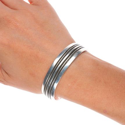 6.25" Vintage Navajo sterling silver banded modernist cuff bracelet D feather