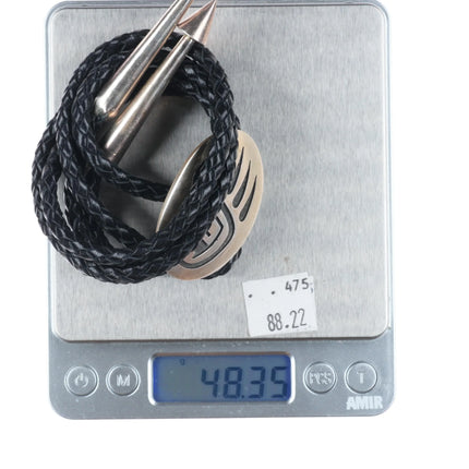 Vintage Gene Pooyouma Hopi Overlay bear paw bolo tie sterling silver