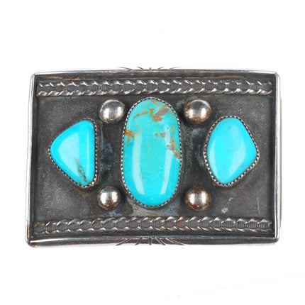 Vintage Navajo sterling silver belt buckle with three turquoise