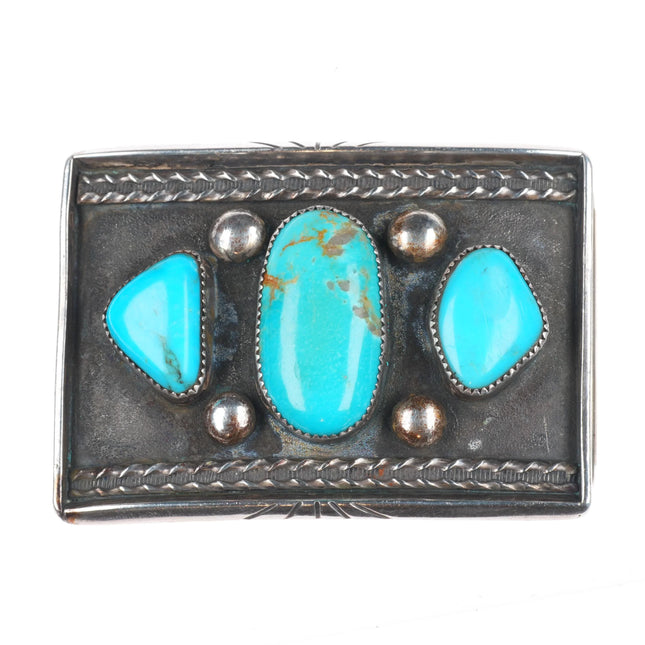 Vintage Navajo sterling silver belt buckle with three turquoise