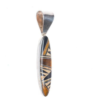 Navajo sterling silver tiger's eye, petrified wood, black jade inlay pendant
