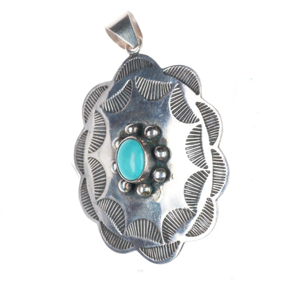 Vintage Navajo precisely stamped sterling silver pendant with turquoise