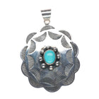 Vintage Navajo precisely stamped sterling silver pendant with turquoise
