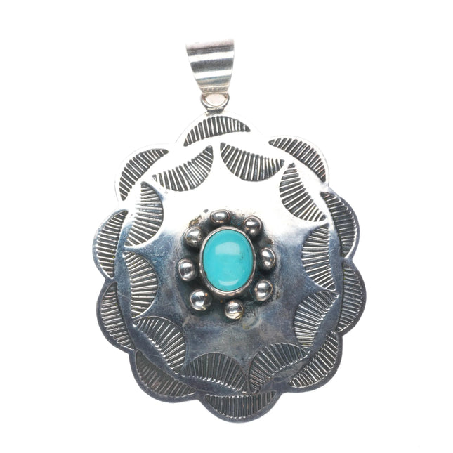 Vintage Navajo precisely stamped sterling silver pendant with turquoise