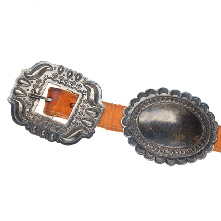Vintage Navajo sterling silver heavily stamped concho belt