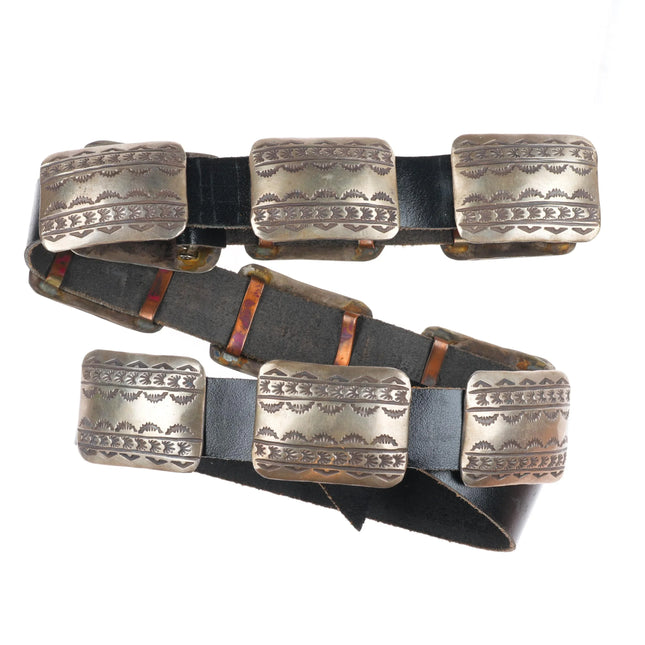 Vintage  Calvin Mariano Navajo sterling silver heavily stamped concho belt