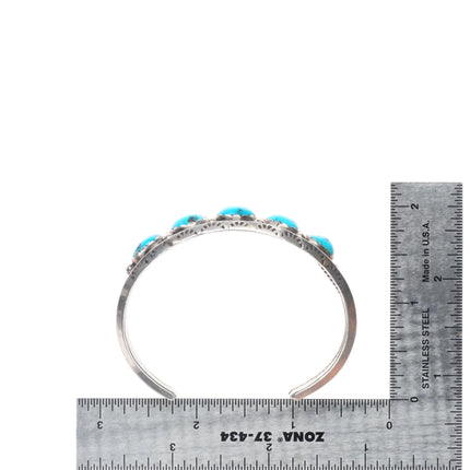 6.2" E Navajo sterling silver Kingman turquoise carinated row cuff bracelet