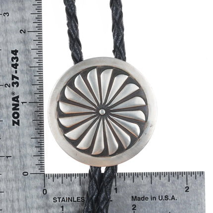 Vintage Navajo sterling silver stamped pinwheel design bolo tie