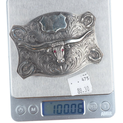 Ahmad Khan Hand Engraved sterling silver longhorn belt buckle with ruby eyes