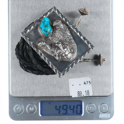 Vintage southwestern sterling silver bear bolo tie with turquoise