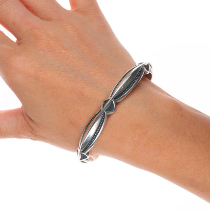 7" Harry H Begay Navajo carinated heavily stamped sterling silver cuff bracelet