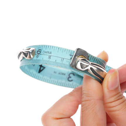 7" Harry H Begay Navajo carinated heavily stamped sterling silver cuff bracelet