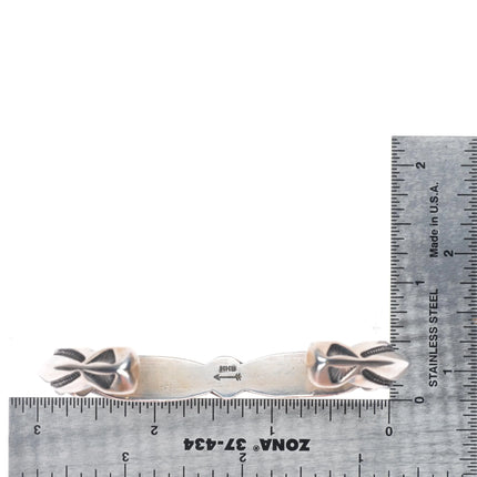 7" Harry H Begay Navajo carinated heavily stamped sterling silver cuff bracelet