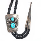 Vintage GG Navajo sterling silver double turquoise bolo tie w/feather design