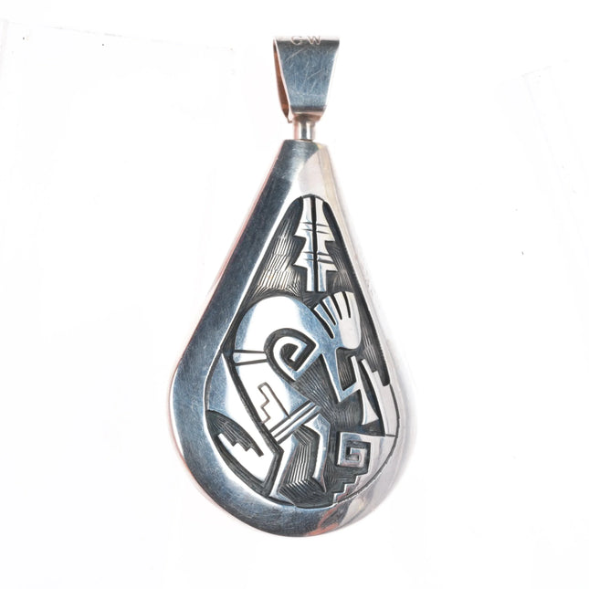 Cheryl Wadsworth Hopi overlay spinner Kokopelli/sunface pendant sterling silver