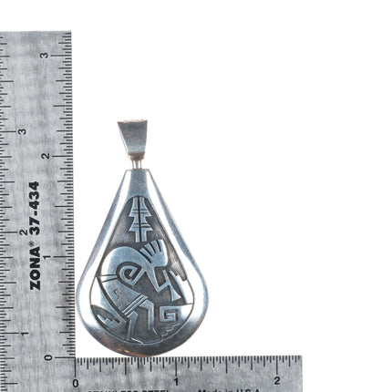 Cheryl Wadsworth Hopi overlay spinner Kokopelli/sunface pendant sterling silver
