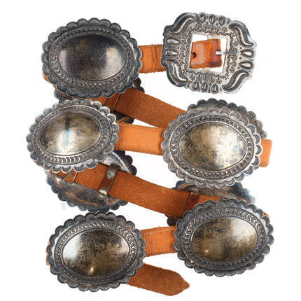 Vintage Navajo sterling silver heavily stamped concho belt