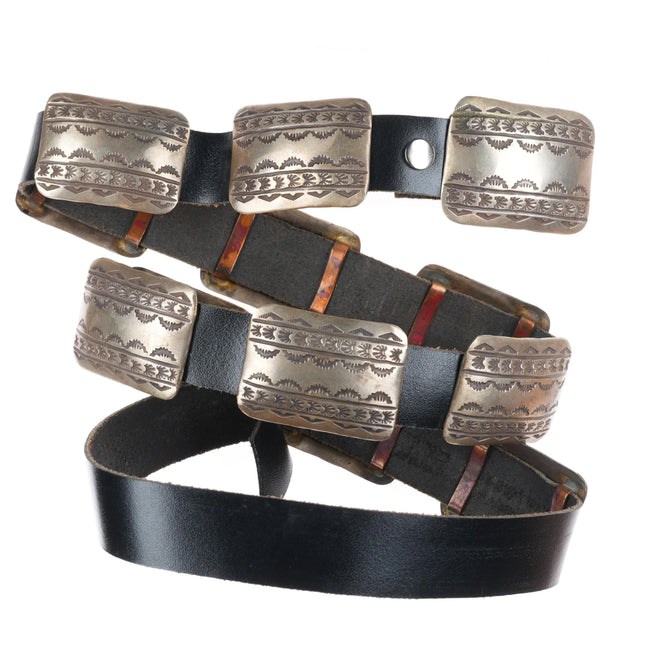 Vintage  Calvin Mariano Navajo sterling silver heavily stamped concho belt