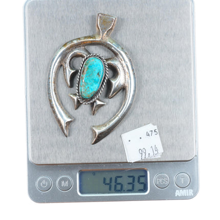 Vintage Navajo cast sterling silver naja pendant with turquoise
