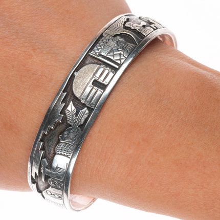 6.75" Vintage Navajo sterling silver storyteller overlay cuff bracelet