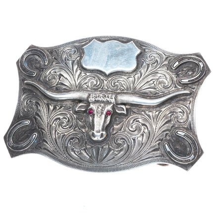 Ahmad Khan Hand Engraved sterling silver longhorn belt buckle with ruby eyes