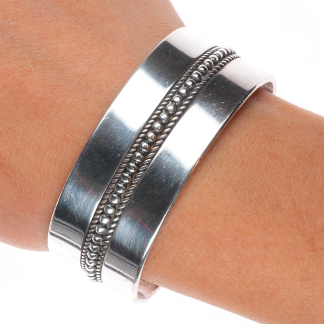 6.6" Yazzie Johnson Navajo plain sterling silver cuff bracelet w/center design