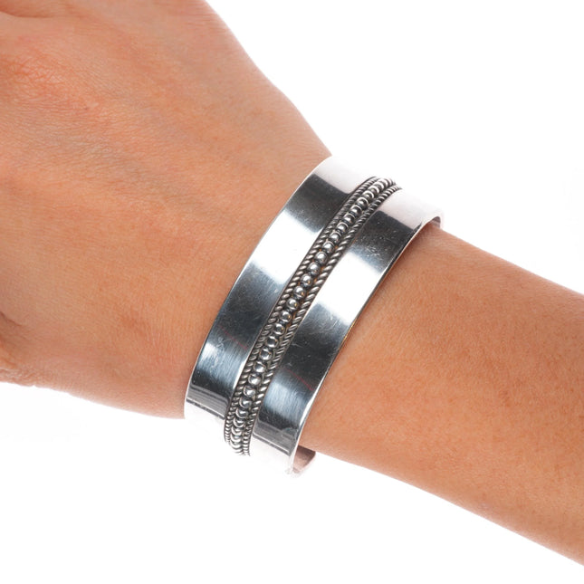 6.6" Yazzie Johnson Navajo plain sterling silver cuff bracelet w/center design