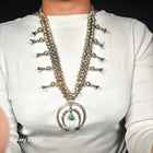 Vintage Navajo sterling silver squash blossom necklace with center turquoise